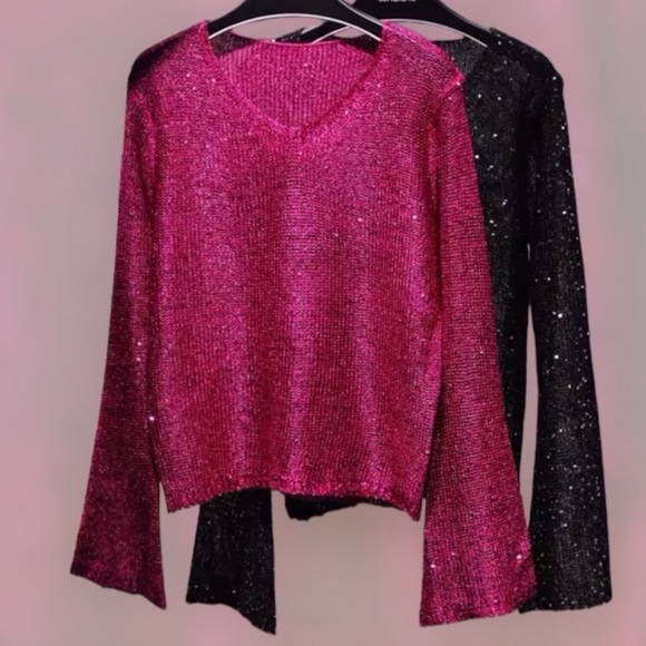 Raspberry Glimmer Metallic Flare
Sleeve Knit Top
$74 $74 - Picture 2 of 2